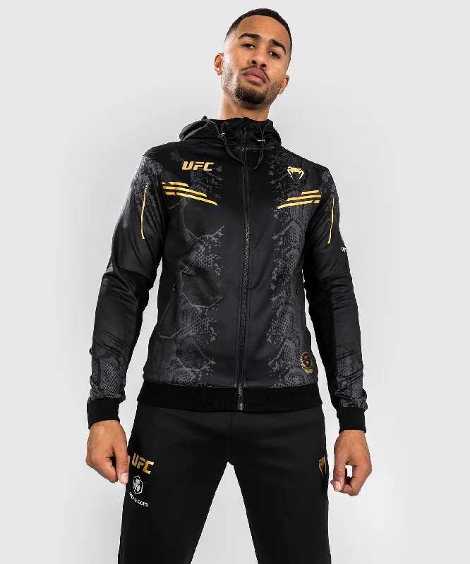 Bargain Blast UFC Adrenaline by Venum Authentic Fight Night Men’s Walkout Hoodie - Champion Bargain Blast UFC Adrenaline by Venum Authentic Fight Night Men’s Walkout Hoodie - Champion